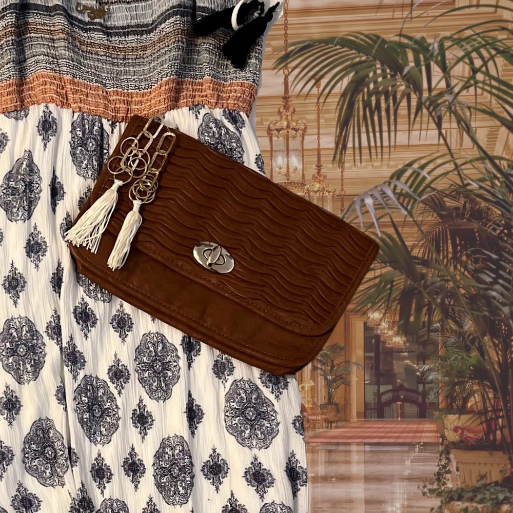 6. XXI Caramel Clutch Purse